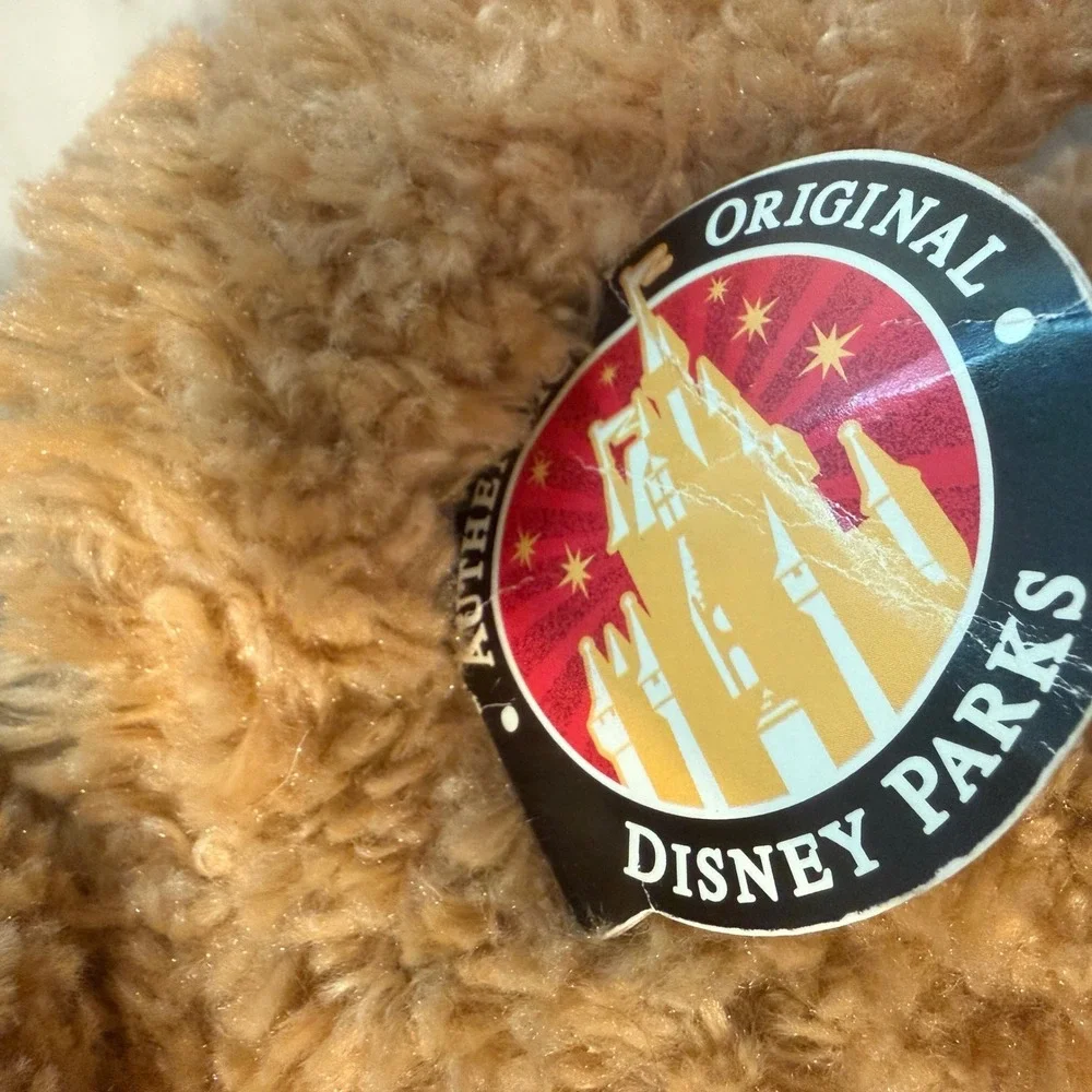 Preowned Disney Parks‎ Duffy the Disney Bear plush with original tag attached